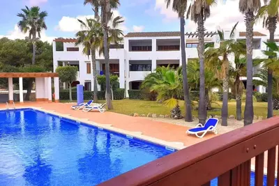 Image de Appartement 'en complejo con piscina' avec piscine partagée et Wi-Fi