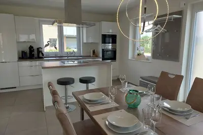 Image de New! modern, high-quality, central apartment, with sauna, garden, wallbox in Burhave