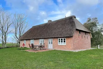 Image de Thatched roof, fence, Wlan, sauna, fireplace, six persons