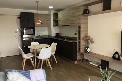 Image de Mini departamento con piscina, gimnasio y balcón.