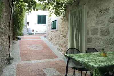 Image de Appartement de deux chambres avec la terrasse Postira, Brac (A-19107-a)