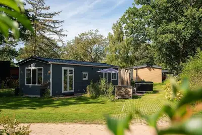 This bungalow with hot tub has everything you need!