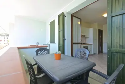 Image de Residence in a residence on the seafront, with terrace and barbecue, private garden with parking space.