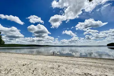 Image de The Maine Lake House with an Amazing Sand Beach!