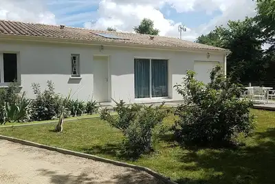 Image de Maison neuve toute équipée avec terrasses, barbecue, terrain arboré clos au calme