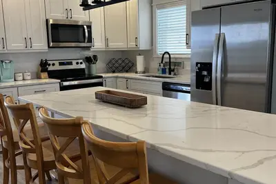 Image de “2 Impulsive” Luxury Condo Steps from the beach in the Beach Club at Whalehead