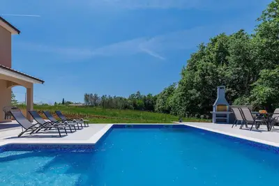 Image de Joli appartement avec Wifi, piscine privée, climatisation, Tv, terrasse et vue panoramique