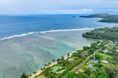 Image de Tropical home across from Anini Beach with amazing deck & small ocean view