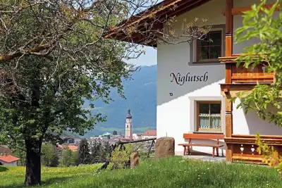 Image de Appartement 'Niglutsch - Puflatsch' avec vue sur les montagnes, balcon et Wi-Fi.