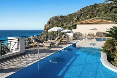 Image de Appartement 'Sunset Premium Studio B' avec vue sur mer, piscine partagée et Wi-Fi.