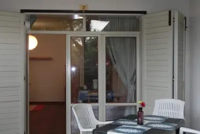 Appartement de vacances avec climatisation, balcon et piscine