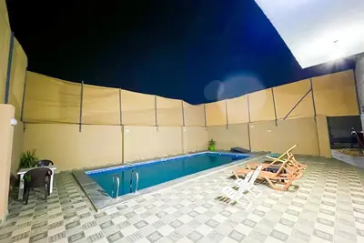 Image de Cheerful two bedrooms villa with warm pool, playground, & specious sitting room.