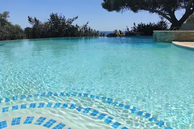 Image de Villa With 3 Units Around Amazing Infinity Pool And Sea-View