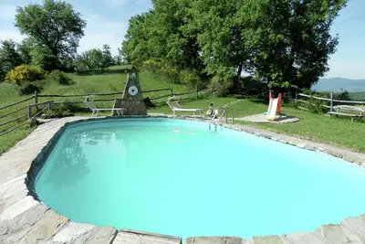 Image de Maison de vacances Ă Ortignano avec piscine