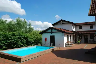 Image de Schönes Ferienhaus à Dargun avec piscine