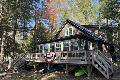 Image de Cozy  Sebec Lake front cabin with dock and fire pit