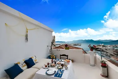 Image de Maison de vacances Astra sur l'île d'Égine avec une vue magnifique sur le coucher du soleil