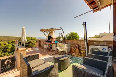 Image de Maison de vacances Casa Alice avec vue sur la mer, jardin et climatisation.