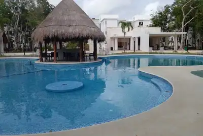 Image de 2 & 1/2 miles to beach. Furnished Condo in Puerto Morelos, Mexico. Pet Friendly!