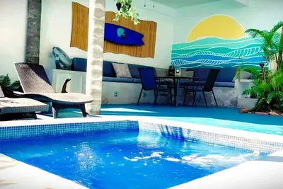 Image de Tranquil hidden oasis 5 min from plaza and beach.