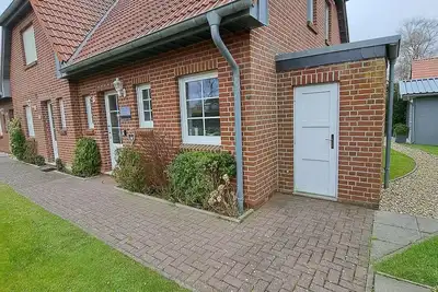 Image de Comfortable vacation home with sauna in Neßmersiel 1 min. to the indoor playground