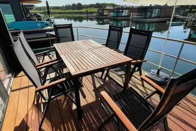 Image de Bateau-maison pour 6 personnes env. 44 qmà Klitten, Lusace (Région des lacs de Lusace)