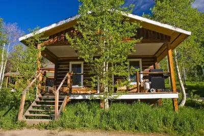 Image de Caron House - A Well-Equipped Square Log Cabin!