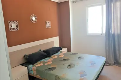 Image de Appartement 'Piso Pozo Nuevo' près de la plage, avec balcon et climatisation.