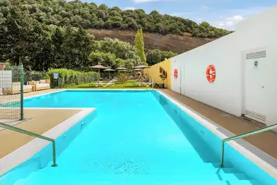 Image de Appartement \"Casa de 10 - 2b\" avec vue sur les montagnes, piscine partagée et Wi-Fi.