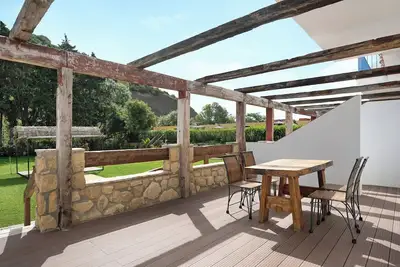 Image de Appartement 'Casa de 10 - 3b - Accessible' avec vue sur les montagnes, piscine partagée et Wi-Fi.