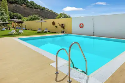 Image de Appartement \"Casa de 10 - 4i\" avec vue sur les montagnes, piscine partagée et Wi-Fi.