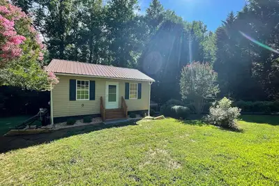 Image de **New Rental** - Cozy Cabin on the River! - Family Fun & Outdoors