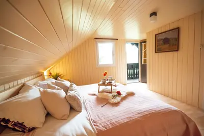 Image de Romantic Slovenian wooden chalet with hot tub - 5 min from