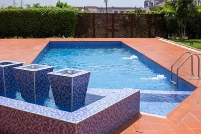 Image de Cheerful 3-bedroom home with a pool and gym