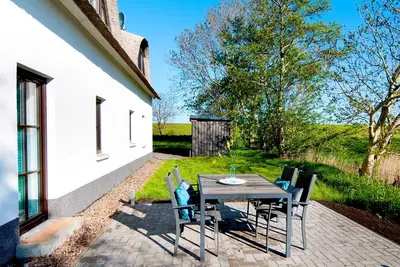 Image de Ferienhaus für 5 Gäste mit 49m² in Tossens