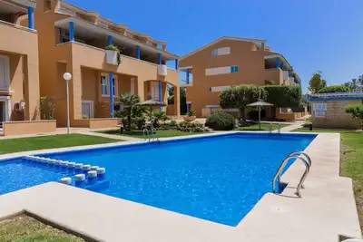 Image de Menorca Duplex Javea, avec terrasse, piscine communautaire et très proche de la plage