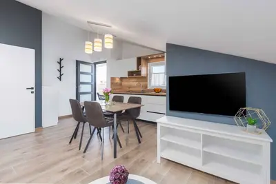 Image de Appartement de vacances avec jardin et transats