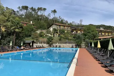 Image de Bel appartement avec piscine, bain Ă remous, Wifi, Tv, terrasse, animaux admis et parking