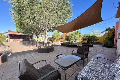 Image de One lot with main house, casita, and large green yard