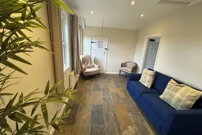 Image de Cosy Family Cottage. Sleeps 12. Close to the beach and town. Pet Friendly!