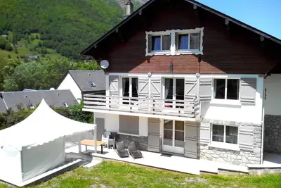 Image de Chalet 4 * de 14 personnes avec Spa extérieur