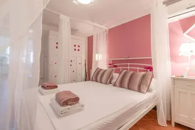 Image de Appartement de deux chambres avec la terrasse Banjol, Rab (A-19804-a)