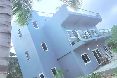 Huge modern Beach Villa dream 4 stories 360 views reef and lagoon