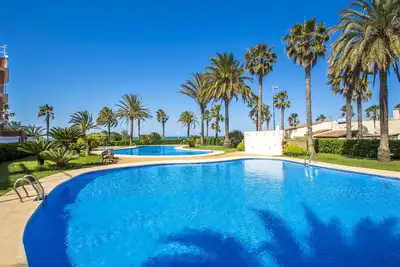 Image de Joli appartement avec climatisation, Wifi, piscine, Tv, terrasse, animaux admis et parking