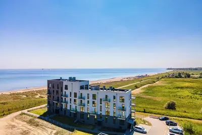 Image de \"BeachTerraceTwo\" vacation apartment on the beach with sun terrace, sauna & sea view