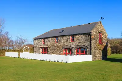 Image de Wisteria Cottage is set in the north of the Isle of Man in an expanse of farmland providing the perf