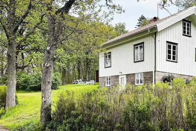 Image de Maison de vacances pour 6 a Brastad-By Traum