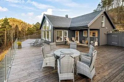 Image de Maison de vacances pour 8 a lyngdal-By Traum