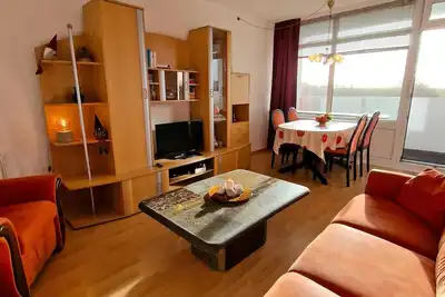 Friendly vacation apartment with a beautiful view of the countryside and a separate bedroom.