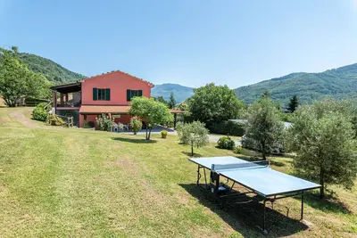 Image de Villa 'Rifugio Arcobaleno' avec vue sur les montagnes, piscine chauffée & Wi-Fi